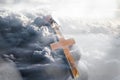 Jesus Christ Golden Cross In Hand With Clouds In Background Royalty Free Stock Photo