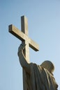 Jesus Christ holds passion cross Royalty Free Stock Photo