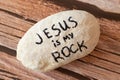 Jesus Christ is my God, Rock, Salvation, Savior, and Deliverer. A handwritten quote from Holy Bible on a stone. Royalty Free Stock Photo