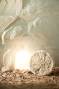 Jesus Christ resurrection. Christian Easter concept. Empty tomb of Jesus with light. Born to Die, Born to Rise. He is Royalty Free Stock Photo