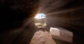 Jesus Christ resurrection and three crosses on the hill from inside the grave Royalty Free Stock Photo