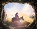 Jesus Christ riding donkey with tomb stone Royalty Free Stock Photo