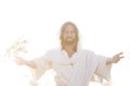Jesus Christ Smiles From Heaven with Arms outstretched  in Light Royalty Free Stock Photo