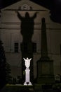 Jesus Christ statue behind St. Louis Cathedral in New Orleans, Louisiana by night Royalty Free Stock Photo