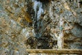 Jesus Christ statue in the rock with hands pointing to the sky