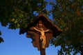 Jesus Christ on the wood cross on blue sky background.Christian and catholic faith symbol.Religious symbol.Easter Royalty Free Stock Photo