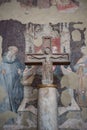 Crucified Jesus on stone cross, Cathedral of Bologna, Italy