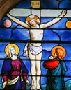 Jesus on the Cross - Stained Glass in Saint Severin Church, Paris Royalty Free Stock Photo