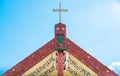 The Jesus cross on the top of local church in Whakarewarewa the living Maori village, New Zealand. Royalty Free Stock Photo