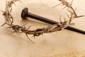 Jesus Crown Thorns and nail on Old and Grunge Background. Vintage Retro Style. Royalty Free Stock Photo