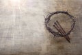 Jesus Crown Thorns and nails on Old and Grunge Wood Background. Vintage Retro Style. Free space for text
