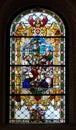 Jesus the Friend of Children, stained glass window in the Church of Saint Catherine of Alexandria in Zagreb Royalty Free Stock Photo