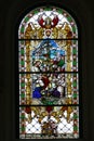 Jesus the Friend of Children, stained glass window in the Church of Saint Catherine of Alexandria in Zagreb Royalty Free Stock Photo