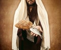 Jesus gives bread and fish Royalty Free Stock Photo