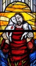 Jesus the Good Shepherd, stained glass window in Chapel at cemetery in Ursberg, Germany