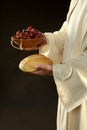 Jesus Holding Grapes and Wine