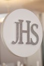 THe JHS sign during the First Holy Communion Reception