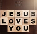 Jesus Loves You Spelled in Blocks on a Leather Holy Bible