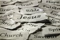 Jesus and religious torn paper words