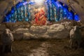 Jesus`s birth in a cave on hay.