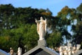 Jesus statue on a headstone Royalty Free Stock Photo