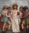 Jesus is stripped of His garments, 10th Stations of the Cross Royalty Free Stock Photo