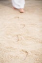 Jesus walking leaving footprints Royalty Free Stock Photo