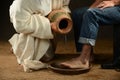 Jesus Washing Feet of Modern Man Royalty Free Stock Photo