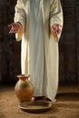 Jesus With Water Jar and Pan Royalty Free Stock Photo