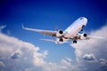 Jet Aeroplane Landing Through Gap in Stormy Sky Royalty Free Stock Photo