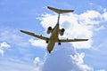 Jet aircraft in a cloudy sky Royalty Free Stock Photo