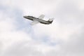 Jet aircraft in cloudy sky Royalty Free Stock Photo