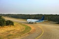 Jet airliner taxiing on the runway