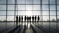 Silhouettes of Business People in an Office Building Royalty Free Stock Photo