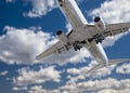 Jet Airplane Landing with Dramatic Clouds Behind