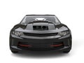 Jet black modern muscle car - front view closeup shot Royalty Free Stock Photo