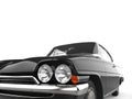 Jet black restored vintage car - headlights closeup shot Royalty Free Stock Photo