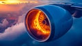 A jet engine flying through the sky with a sunset in the background Royalty Free Stock Photo