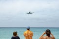 Jet landing at Maho Beach in St. Maarten Royalty Free Stock Photo