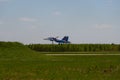 Jet MiG-29 air group aerobatics `Strizhi` comes to landing