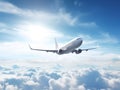 Jet passenger plane flying in blue sky with clouds Royalty Free Stock Photo