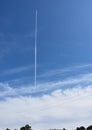 Jet plane flying straight up into the sky Royalty Free Stock Photo