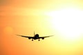 Jet plane, flying, sunset Royalty Free Stock Photo