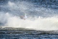 Jet ski driver in action during show with splashing water Royalty Free Stock Photo