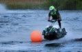 Jet Ski race competitor going over jump . Royalty Free Stock Photo