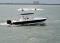 Jet skiers and a sport fishing boat on the Florida Intra-Coastal