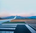 Jet wing prepared for takeoff on runway Royalty Free Stock Photo