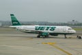 JetBlue Airbus A320 JetGreen aircraft taxing at John F Kennedy International Airport in New York