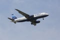 JetBlue Airbus A320 in New York sky before landing at JFK Airport