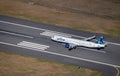 Jetblue Airbus 321 taxiing on a runway at Boston's Logan International Airport